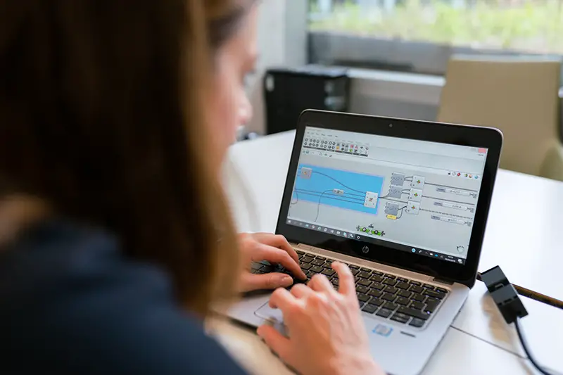 Female engineer using laptop