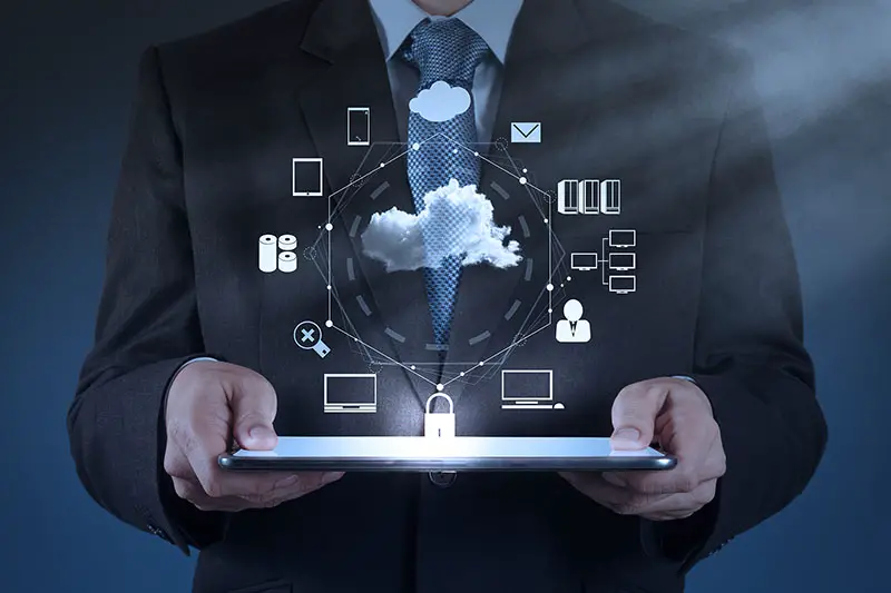 Businessman hand working with a Cloud Computing diagram on the new computer interface as concept