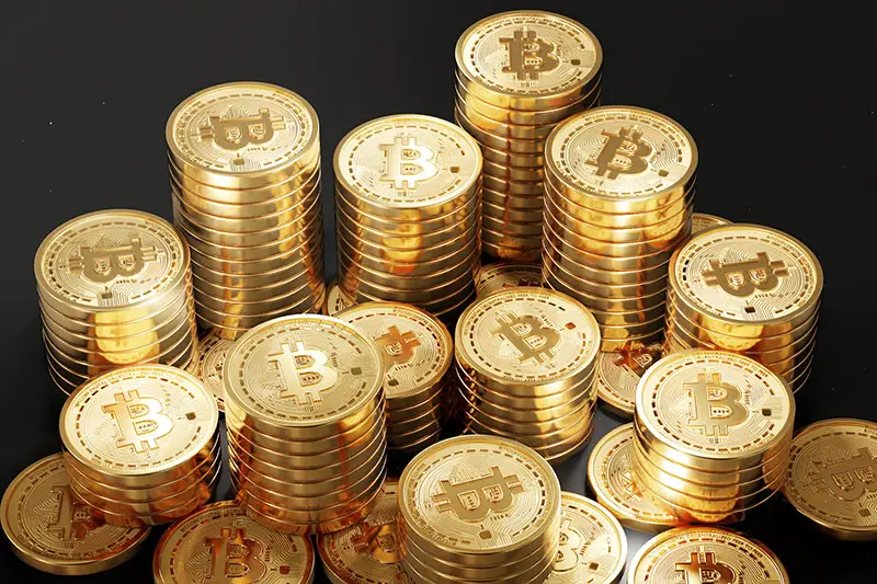 Close up shot of Bitcoin coins isolated on black background