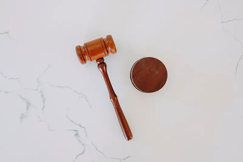 Brown wooden gavel - legal