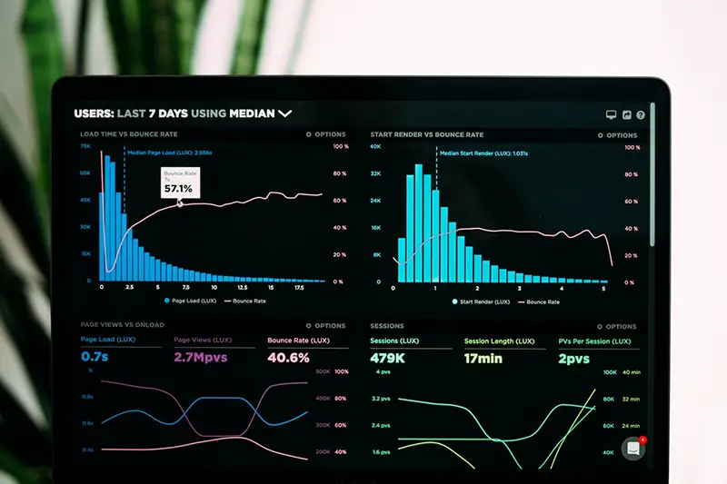 Data analytics on black screen laptop