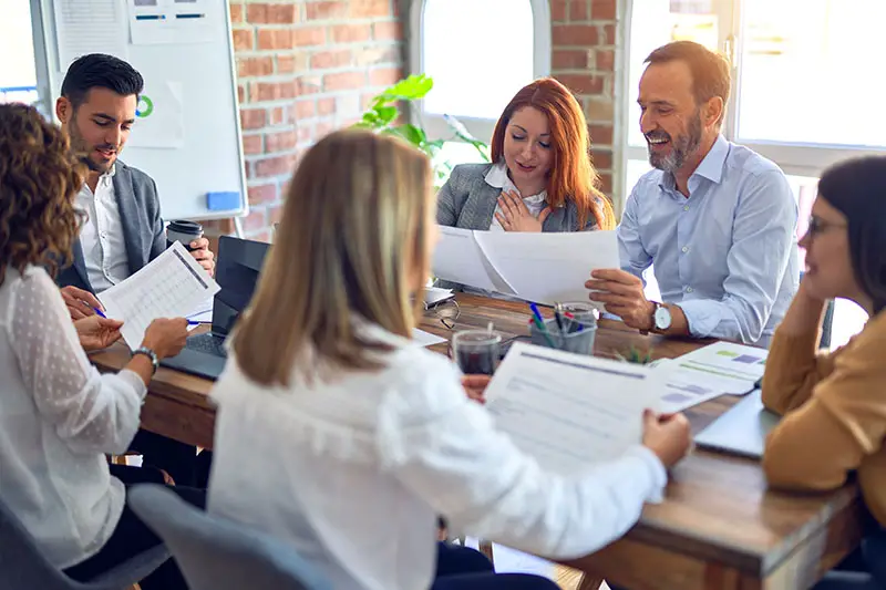 Group of business workers working together