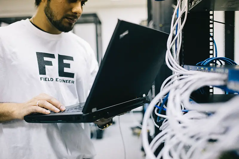 field engineer examining hardware