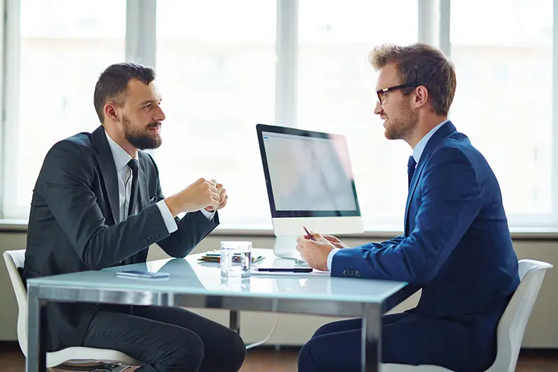 BUsinessman talking to a financial advisor