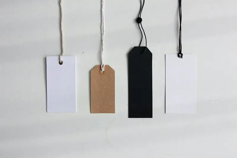 Four paper card tags