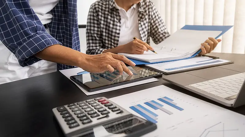 Business team working on financial data report