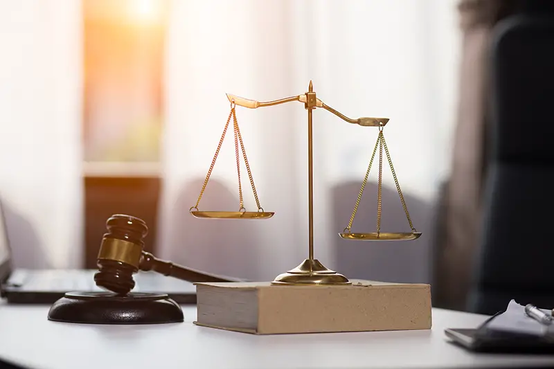 Judge gavel on top of lawyer desk