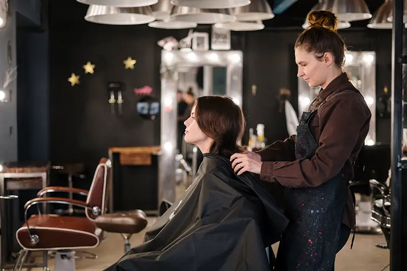 woman getting a haircut