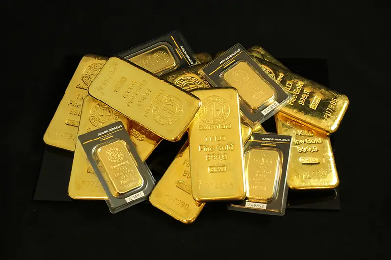 Gold bars in dark background