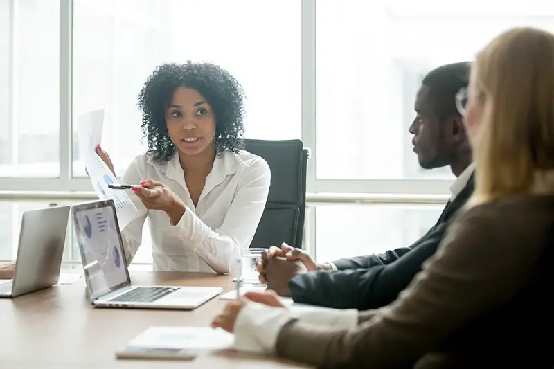 African businesswoman coach talking to her clients