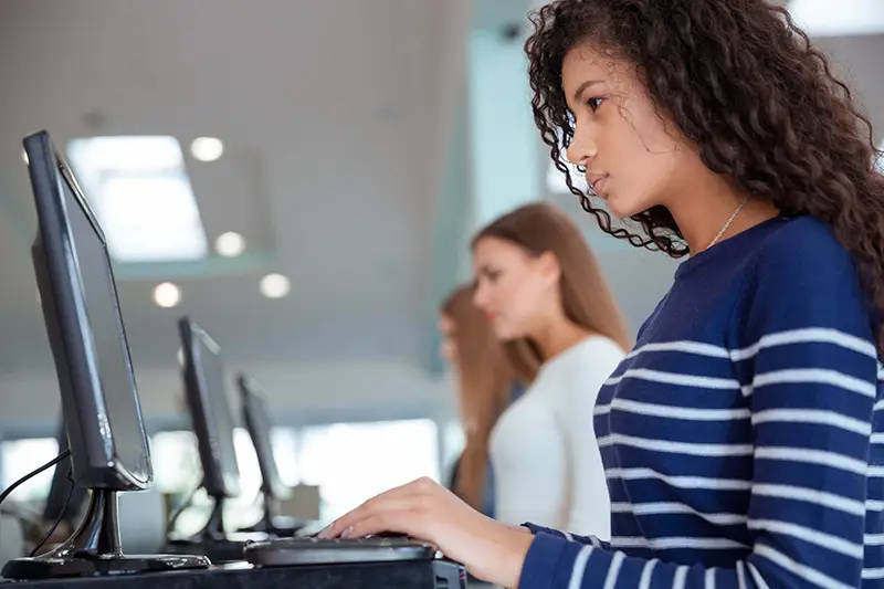 Young woman working in front of computer