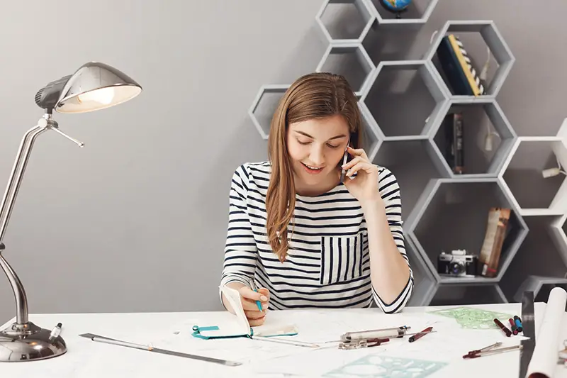 Business woman working while on call