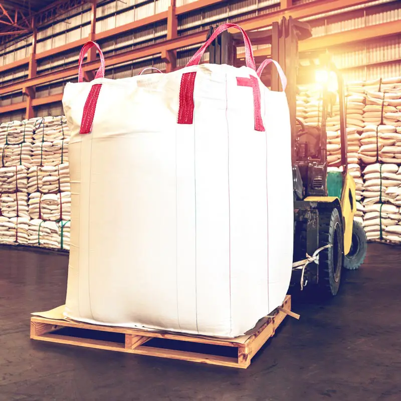 white super sacks near forklift