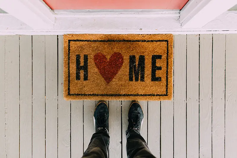 man standing in front of the door