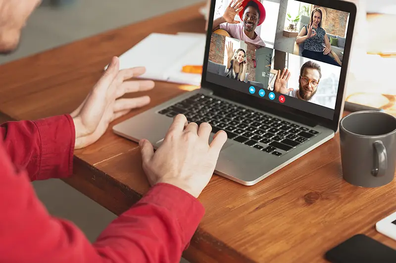 Person working from home while on video conference