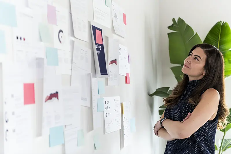 Woman reading information on paperwork