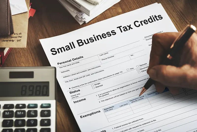 Small Business Tax Credits Claim Return Deduction Refund Concept