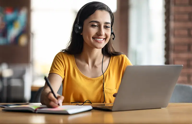 Young girl having online class