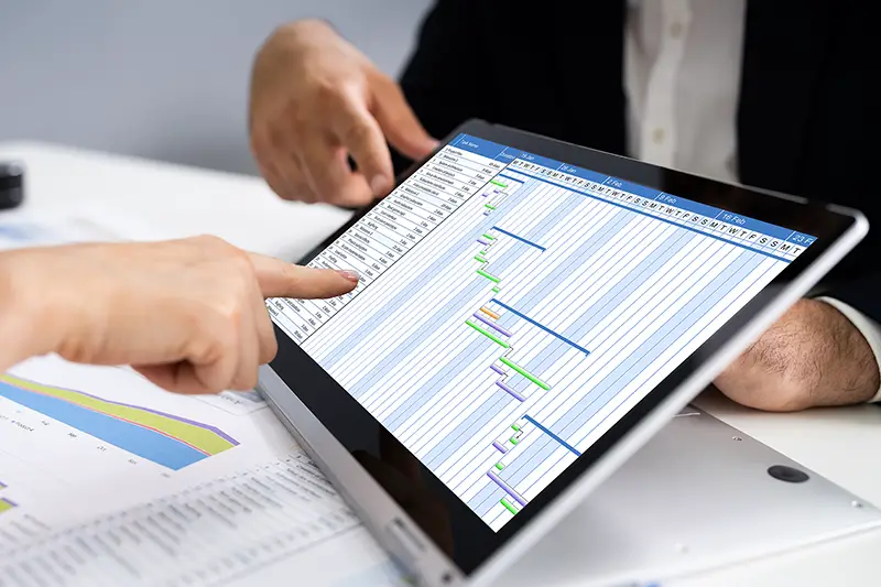 Convertible Laptop With Gantt Software Chart