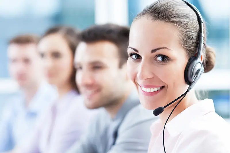 Smiling female call center agent