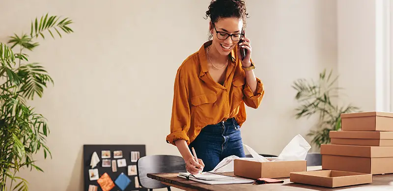 Female entrepreneur working at home office