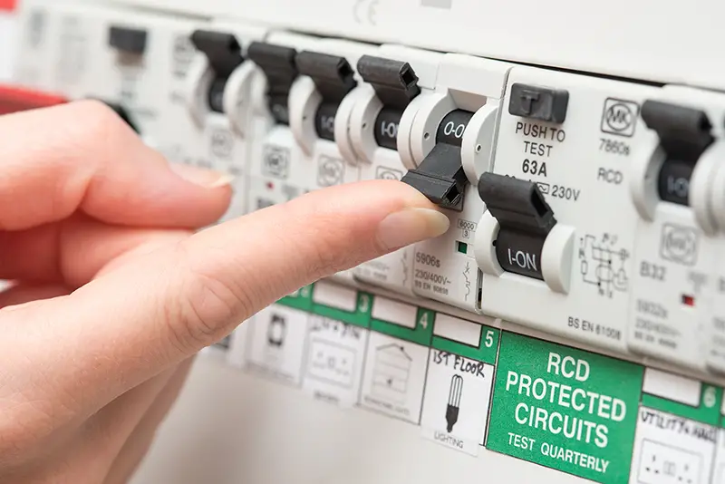 An RCD circuit breaker board displays many switches.