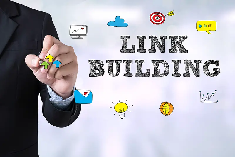 LINK BUILDING Businessman drawing Landing Page on blurred abstract background