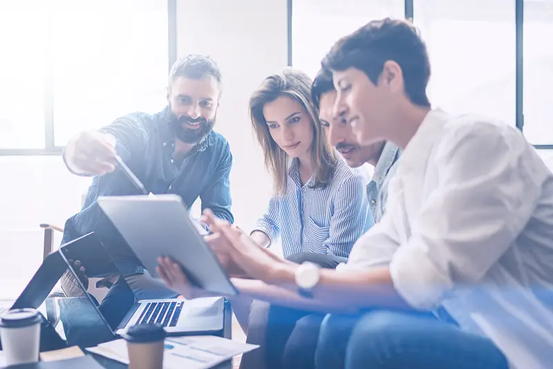 Coworkers team working new startup project at modern office