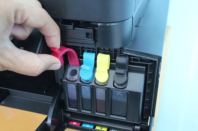Technicians Refill ink cartridges
