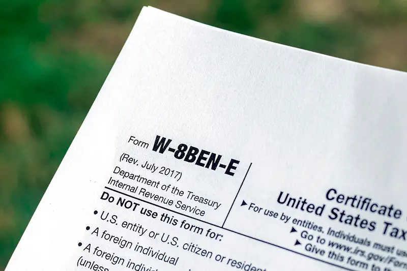 Close-up the documents tax forms w-8-ben form
