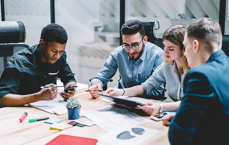 Group of diversity people searching information for provide ideas in new startup project