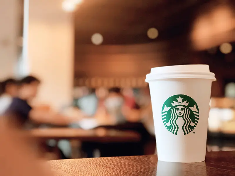 Starbucks Hot beverage coffee on table 