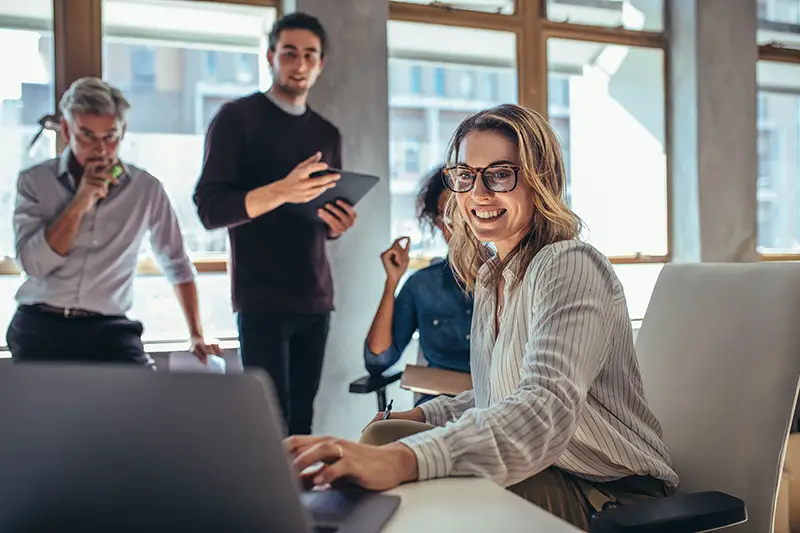 Female entrepreneur working on laptop