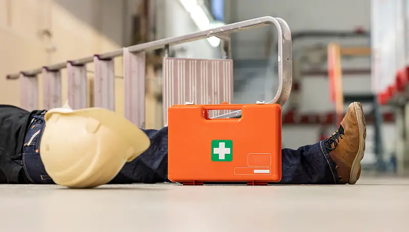 Male body lying on the floor after a work accident