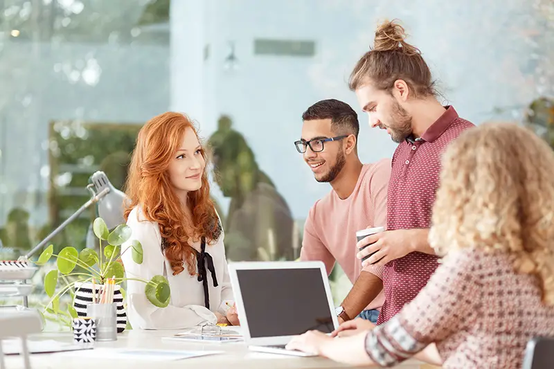 Mixed race workers brainstorming at the advertising agency business office