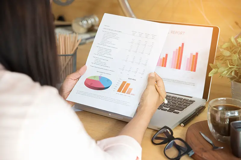 Woman holding a work report