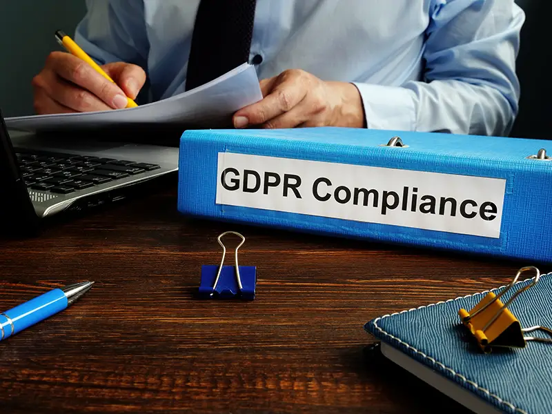 GDPR compliance and man working with papers