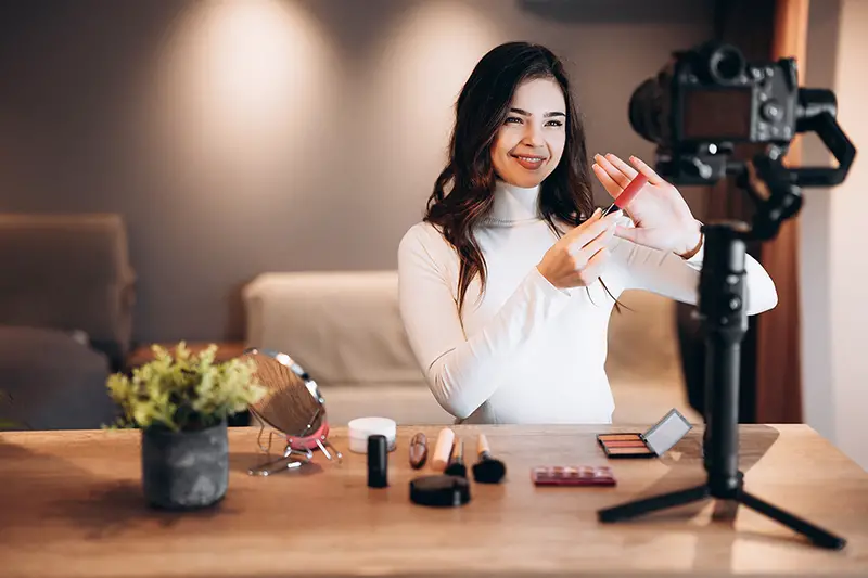 Beauty blogger filming a video