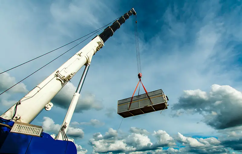 Truck and Crane in site for construction and blue sky