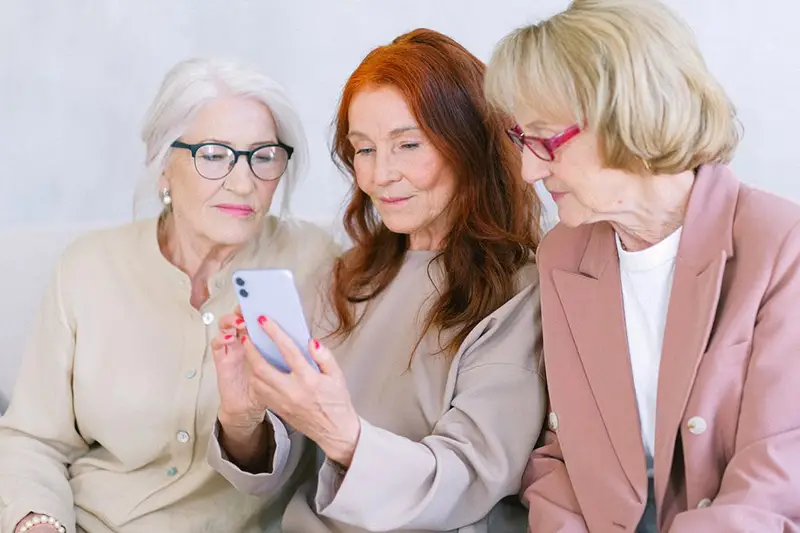 Senior women looking at the smartphone