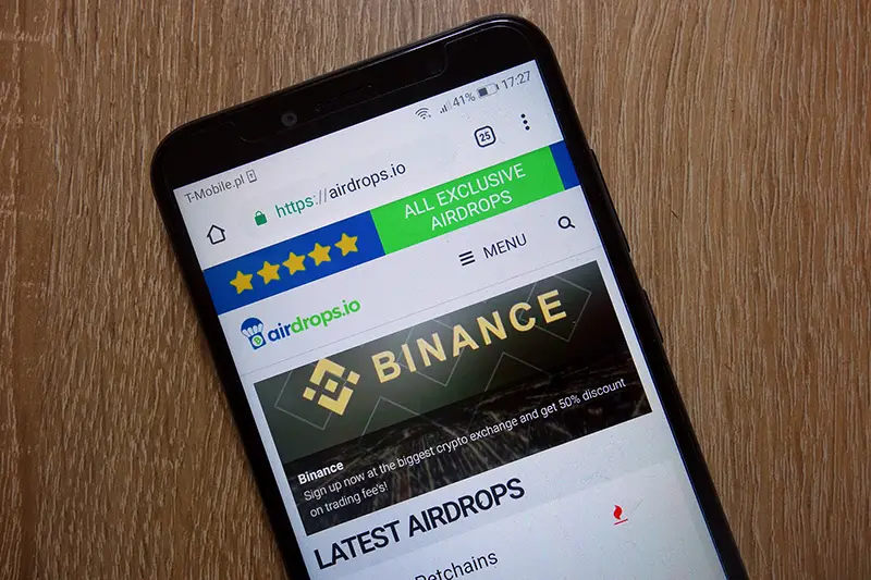 Airdrops.io website displayed on smartphone