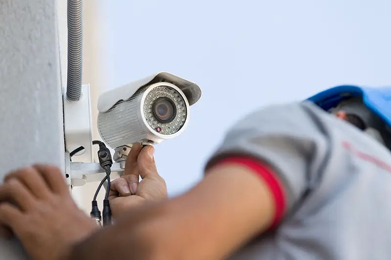 Professional cctv technician working.