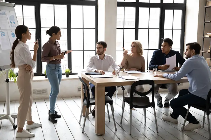 Employees inside the training room