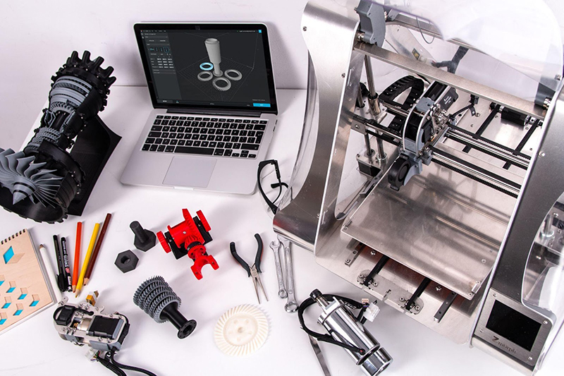 Laptop and 3D printer machine