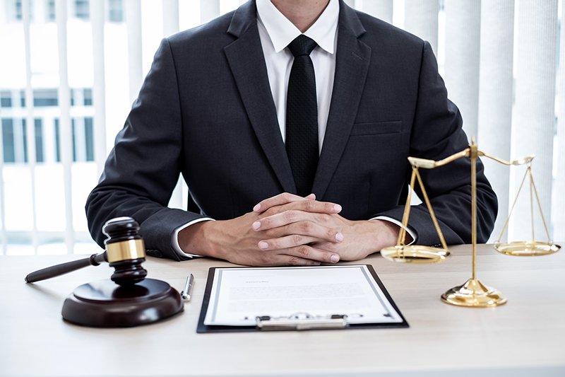 Professional male lawyers work at a law office