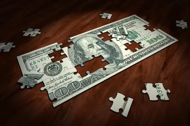 Hundred dollar bill in puzzle