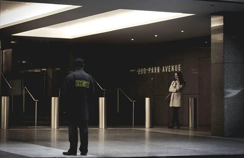 Security officer standing inside the establishment