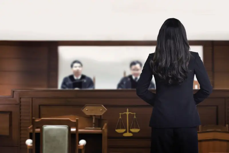 Woman standing in the middle of the  court room
