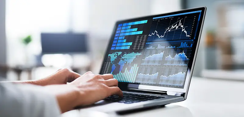 KPI Business Analytics Dashboard On Laptop Computer