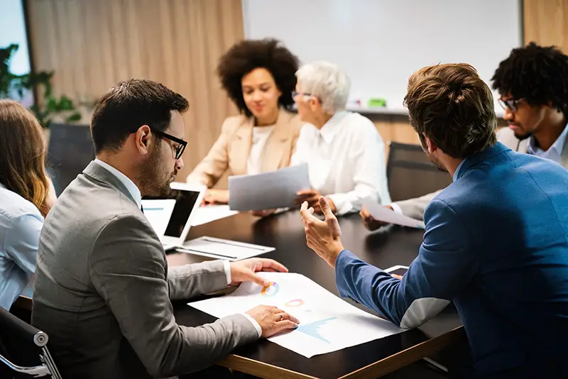 Group of multiethnic business people working at busy modern office